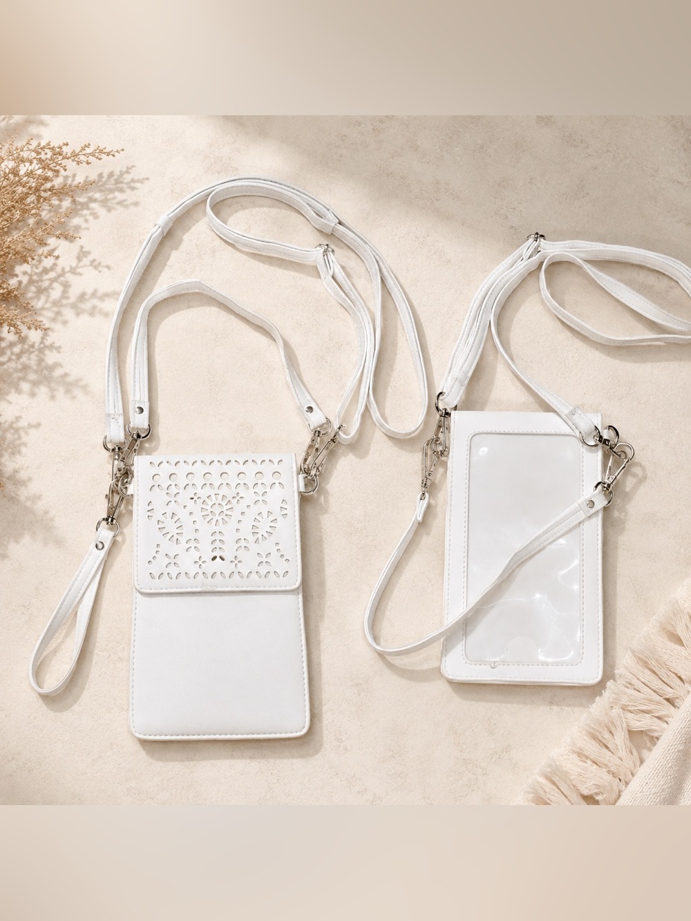 The Lakeside Collection Laser-Cut Touchscreen Crossbody Smartphone Bag